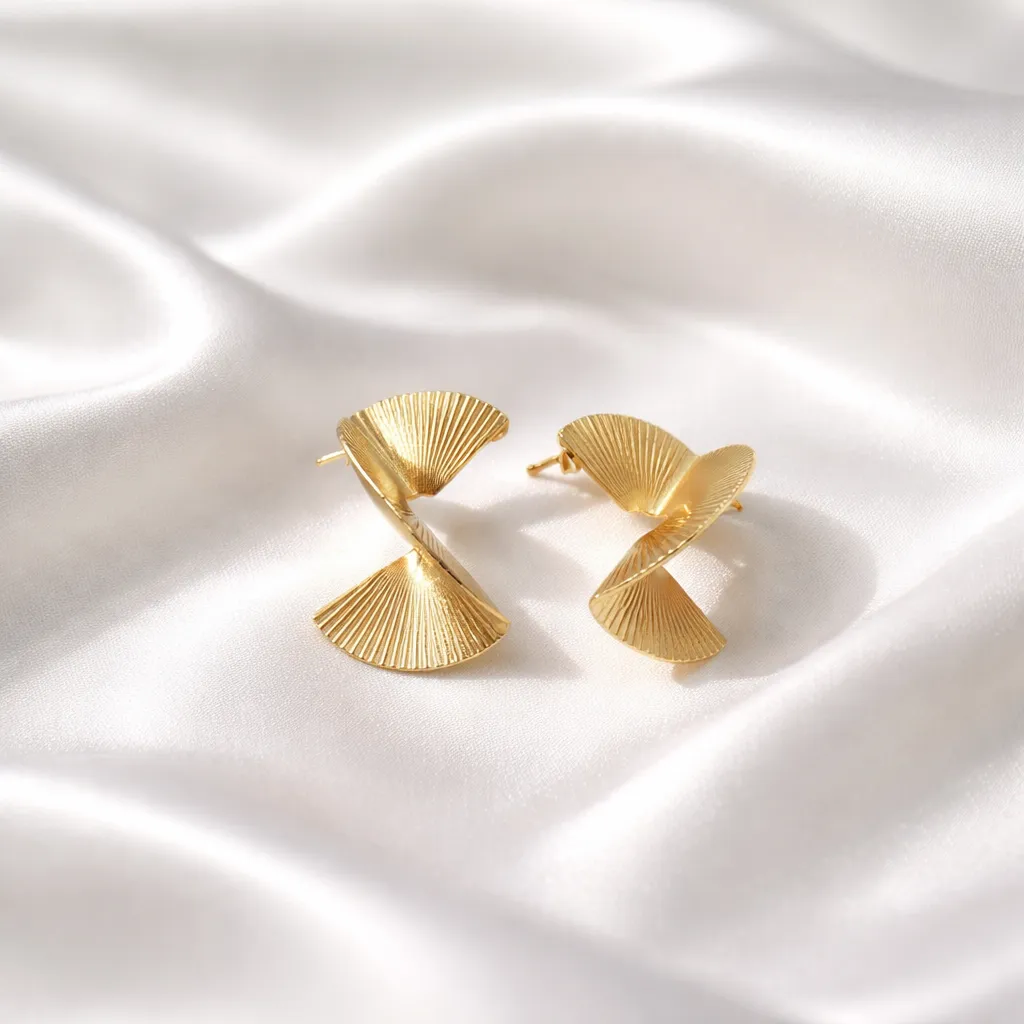 Σκουλαρίκια Gold Ribbed Wave